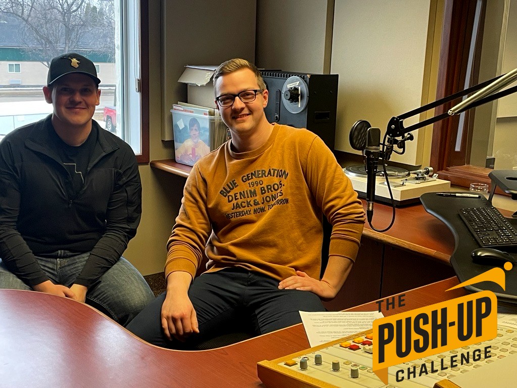 Constable Tristan FournierJones & Zack Driedger doing pushups for